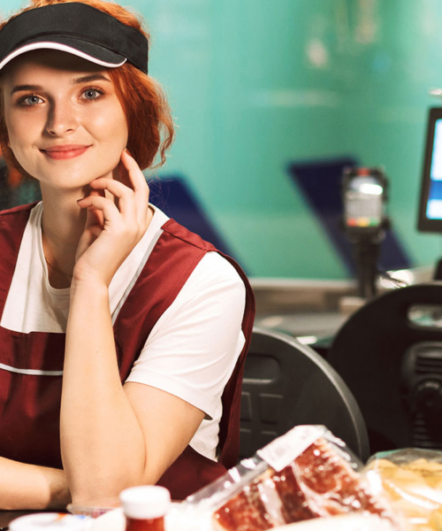 woman working as a cashier in a retail company