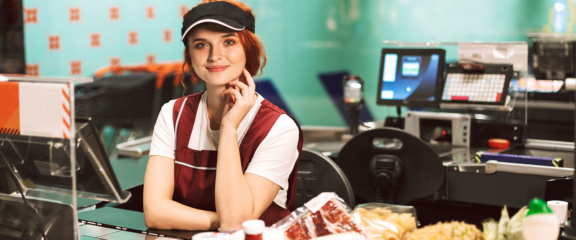 woman working as a cashier in a retail company