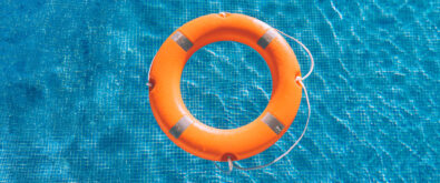 Lifebuoy drifting in the pool with the article title | Open-E JovianDSS