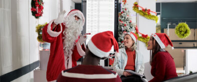 IT Team dressed in christmas outfits