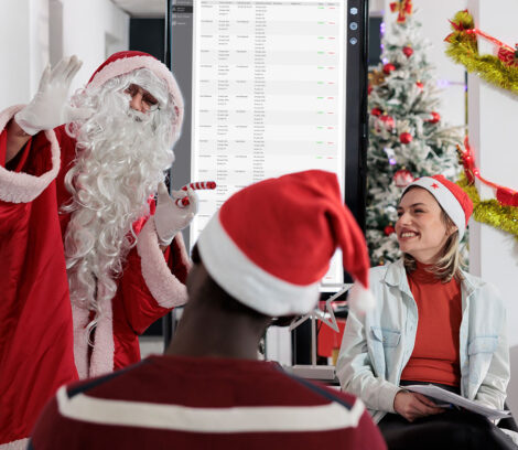 IT Team dressed in christmas outfits
